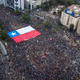 Illustration for article titled Chilean opera singer under curfew cheered after belting a song of protest from her window